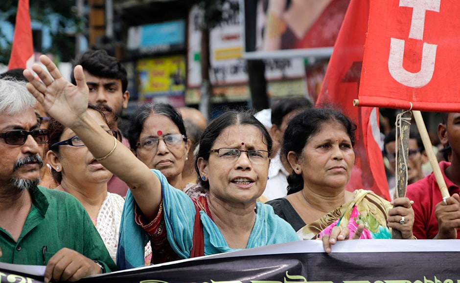 Activists of Communist Party of India-Marxist shout slogans during the nationwide strike, in Kolkata on Friday. Major roads wore a deserted look in the state capital and as public transport was not available, passengers, particularly alighting from trains, had a harrowing time reaching their destination. Activists of Communist Party of India-Marxist shout slogans during the nationwide strike, in Kolkata on Friday. Major roads wore a deserted look in the state capital and as public transport was not available, passengers, particularly alighting from trains, had a harrowing time reaching their destination.