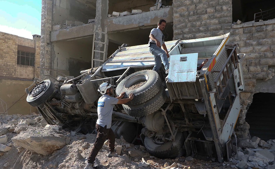 An intense bombing campaign has targeted several neighborhoods in the city, including centers of the award-winning volunteer civil defense group known as the White Helmets. Photo: AP An intense bombing campaign has targeted several neighborhoods in the city, including centers of the award-winning volunteer civil defense group known as the White Helmets. Photo: AP