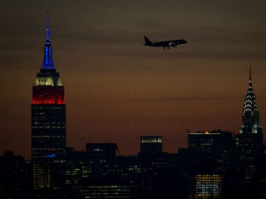 The Empire State building is lit in traditional red, white and blue to commemorate 9/11. Reuters
