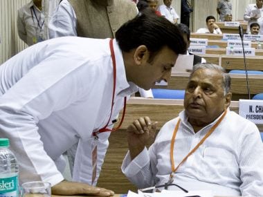 Uttar Pradesh CM Akhilesh Yadav (left) with father Mulayam Singh Yadav. AFP