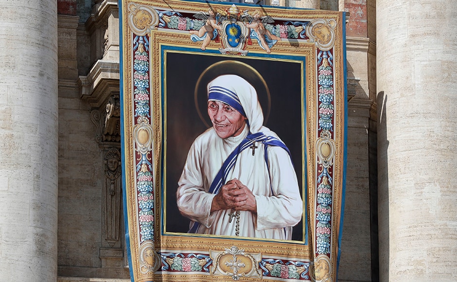 A tapestry showing Mother Teresa hangs from the central balcony of St. Peter's Basilica, in St. Peter's Square, at the Vatican. AP A tapestry showing Mother Teresa hangs from the central balcony of St. Peter's Basilica, in St. Peter's Square, at the Vatican. AP