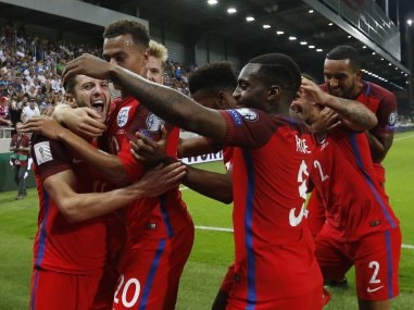 England's Adam Lallana celebrates scoring their first goal. Reuters