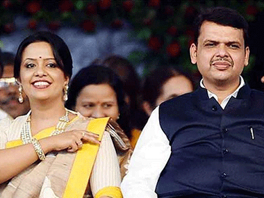 Devendra Fadnavis' wife Amruta attends Christmas-themed charity event; 'Hindu Holocaust', cry Twitterati Devendra Fadnavis' wife Amruta attends Christmas-themed charity event; 'Hindu Holocaust', cry Twitterati