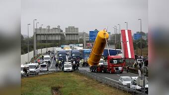 Britain to start building 13 ft wall in French port of Calais to keep out migrants
