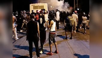 12 officers injured in North Carolina protests after police shooting in Charlotte