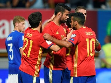 Spain's Diego Costa celebrates his goal with teammates. Reuters
