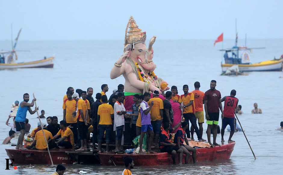Rains worked as a spoil-sport. This year the crowd at Girgaum Chowpatty was half of what it was last year. Sachin Gokhale/Firstpost Rains worked as a spoil-sport. This year the crowd at Girgaum Chowpatty was half of what it was last year. Sachin Gokhale/Firstpost