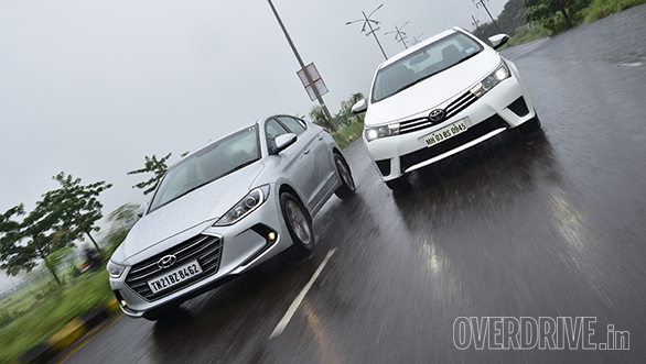 Comparo: Hyundai Elantra SX (O) MT vs Toyota Corolla Altis GL D-4D MT Comparo: Hyundai Elantra SX (O) MT vs Toyota Corolla Altis GL D-4D MT