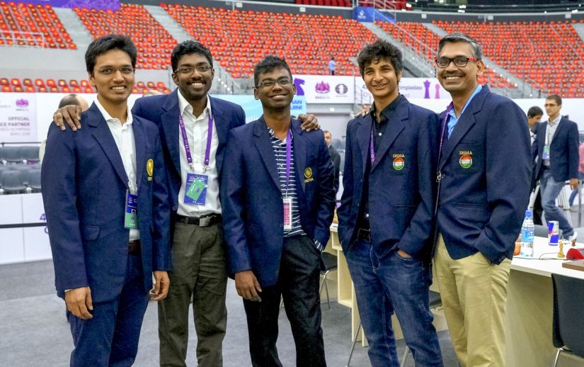 Chess Olympiad: India Men and Women hold fancied rivals to draw, tense last round for medal awaits Chess Olympiad: India Men and Women hold fancied rivals to draw, tense last round for medal awaits