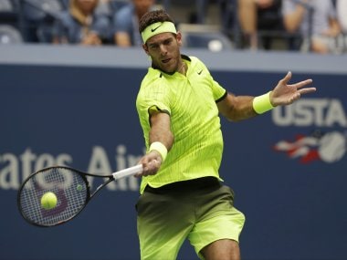 Juan Martin del Potro returns a shot to Dominic Thiem during the fourth round. AP