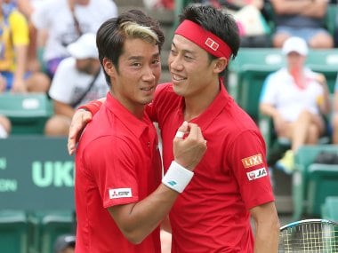 Japan's Kei Nishikori and Yuichi Sugita celebrate their win over Ukraine. AFP