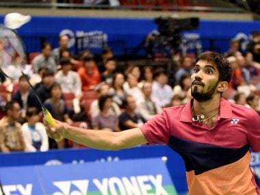 Srikanth Kidambi of India returns a shot against his compatriot Ajay Jayaram. AFP