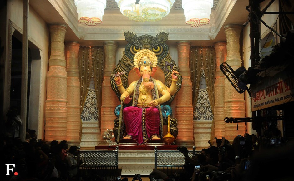 The idol is kept for 11 days before being immersed. Thousans of people visit the pandal everyday to seek the Lord's blessings. Photo: Firstpost/Sachin Gokhale The idol is kept for 11 days before being immersed. Thousans of people visit the pandal everyday to seek the Lord's blessings. Photo: Firstpost/Sachin Gokhale