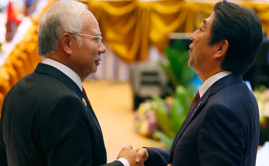 Malaysia's Prime Minister Najib Razak, left, greets Japan's Prime Minster Shinzo Abe prior to the ASEAN Plus Japan meeting in the ongoing 28th and 29th ASEAN Summits at the National Convention Center. AP Malaysia's Prime Minister Najib Razak, left, greets Japan's Prime Minster Shinzo Abe prior to the ASEAN Plus Japan meeting in the ongoing 28th and 29th ASEAN Summits at the National Convention Center. AP