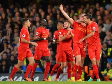 Jordan Henderson scored a screamer to give Liverpool a 2-1 win over Chelsea at Stamford Bridge. AFP