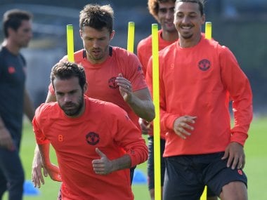 Manchester United players training ahead of their Feyenoord clash. AFP
