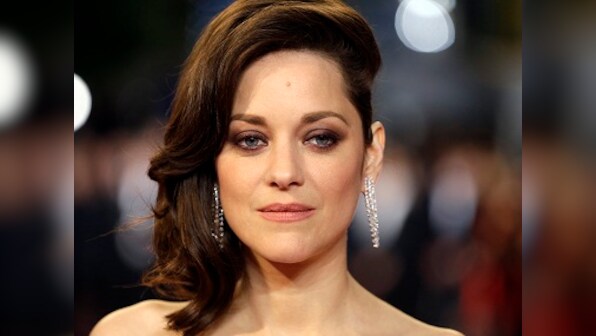 Marion Cotillard denies involvement in Angelina Jolie-Brad Pitt split; announces pregnancy