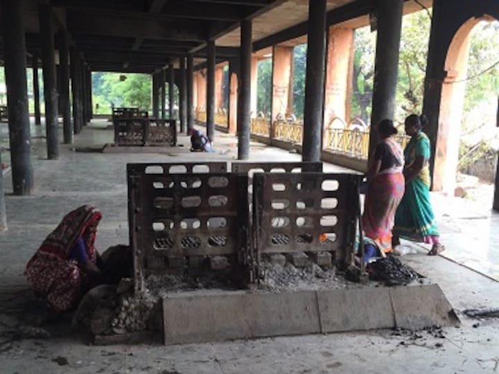 Ashes to ashes: Matang women sift through funeral pyres to earn their livelihood; it's killing them