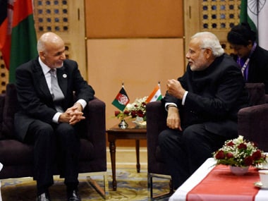 File image of Narendra Modi and Ashraf Ghani. PTI