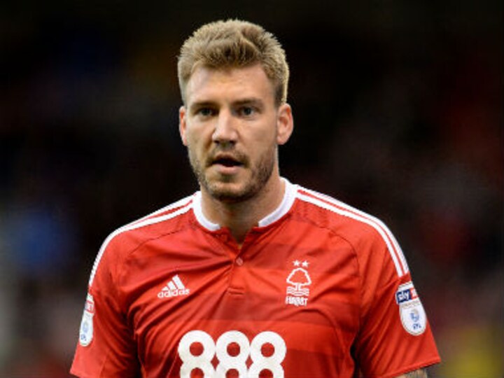 Arsenal boss Arsene Wenger surprised by Nicklas Bendtner's move to Nottingham Forest