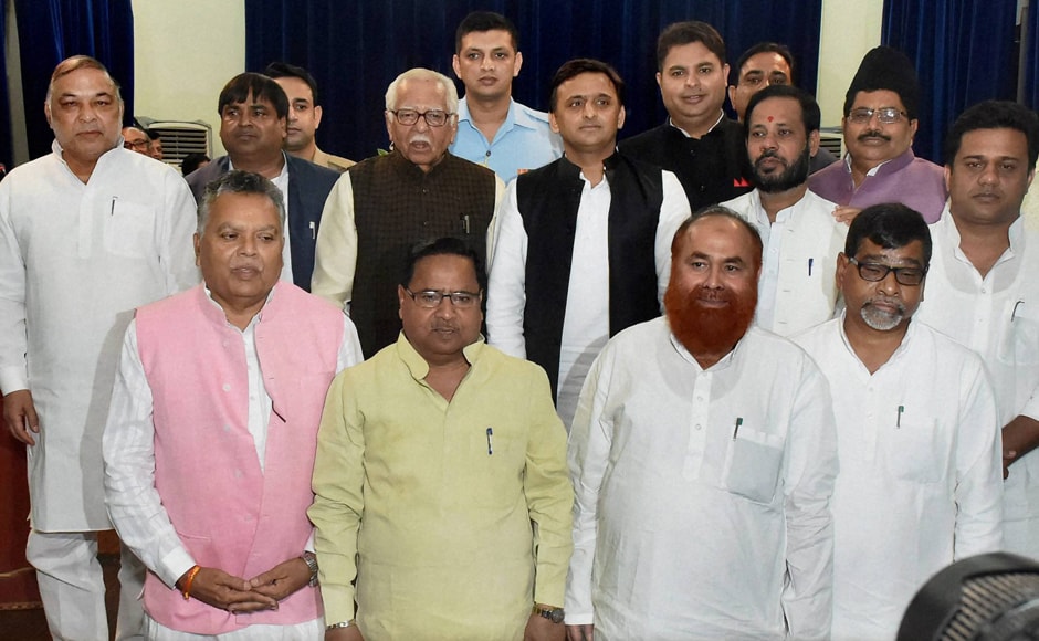 The swearing-in of 10 new ministers, including Gayatri Prasad Prajapati, Manoj Pandey and Shivakant Ojha, who were all sacked by the CM earlier, was conducted at Raj Bhavan by Governor Ram Naik. CM Akhilesh Yadav with the newly sworn-in ministers after their oath taking ceremony in Lucknow on Friday. The Akhilesh ministry now comprises 32 cabinet ministers, 9 MoS (Independent charge) and 19 MoS. (Photo: PTI) The swearing-in of 10 new ministers, including Gayatri Prasad Prajapati, Manoj Pandey and Shivakant Ojha, who were all sacked by the CM earlier, was conducted at Raj Bhavan by Governor Ram Naik. CM Akhilesh Yadav with the newly sworn-in ministers after their oath taking ceremony in Lucknow on Friday. The Akhilesh ministry now comprises 32 cabinet ministers, 9 MoS (Independent charge) and 19 MoS. (Photo: PTI)