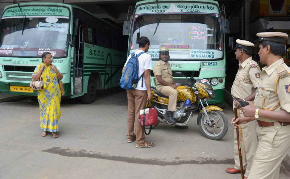 Passengers were left stranded at Shantinagar Bus Stand as Tamil Nadu State Transport Corporation buses were stopped due to Kannada Organizations' protest. Photo: PTI Passengers were left stranded at Shantinagar Bus Stand as Tamil Nadu State Transport Corporation buses were stopped due to Kannada Organizations' protest. Photo: PTI
