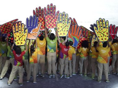 Volunteers take part in the closing ceremony of the Rio Olympics. Reuters