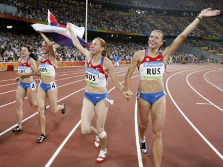 Four more athletes stripped of Olympic medals from 2008 Beijing Games