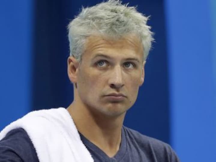 Swimmer Ryan Lochte accepts 14-month suspension from US Anti-Doping Agency for prohibited intravenous infusion