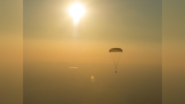 Record-setting American astronaut Jeff Williams, Russian colleagues return to Earth