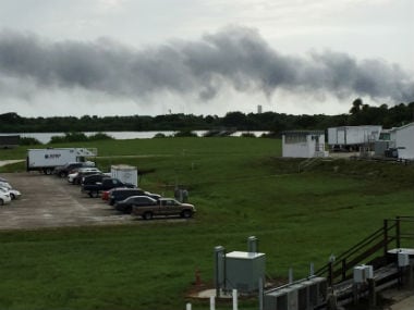 Smoke rises from SpaceX launch site. AP