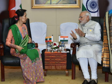 PM Modi meets Aung San Suu Kyi on sidelines of India-Asean and East Asia summits PM Modi meets Aung San Suu Kyi on sidelines of India-Asean and East Asia summits