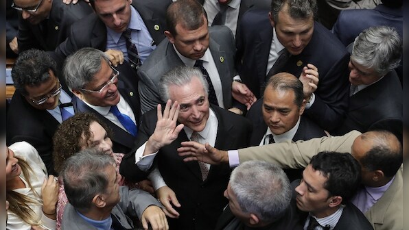 New Brazil prez Michel Temer guarantees jobs and 'political stability'