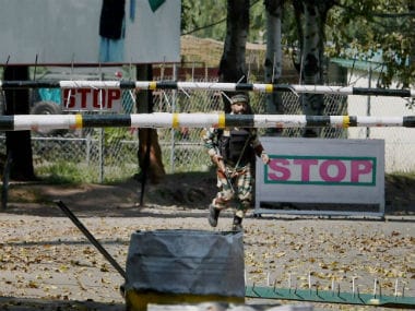 Soldier outside the army camp which was attacked in Uri. PTI