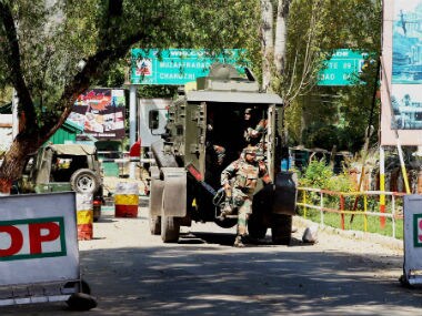 Army soldiers rush to the attack site in Uri. PTI