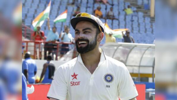 Virat Kohli cuts cake specially customised for India's '500th Test' in Kanpur