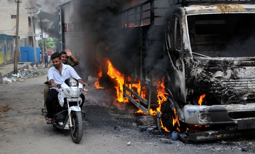It was a sombre Eid for Bangaloreans as well. 40 buses were torched by protesters in the city on Monday. Reuters