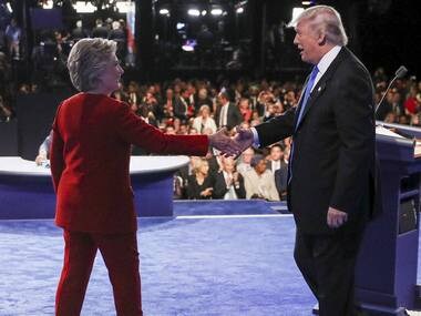 Democratic presidential nominee Hillary Clinton shakes hands with Republican presidential nominee Donald Trump after the presidential debate. AP