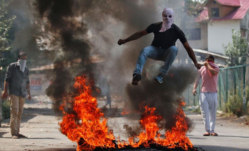 A protester during clashes with security forces in Srinagar. Reuters