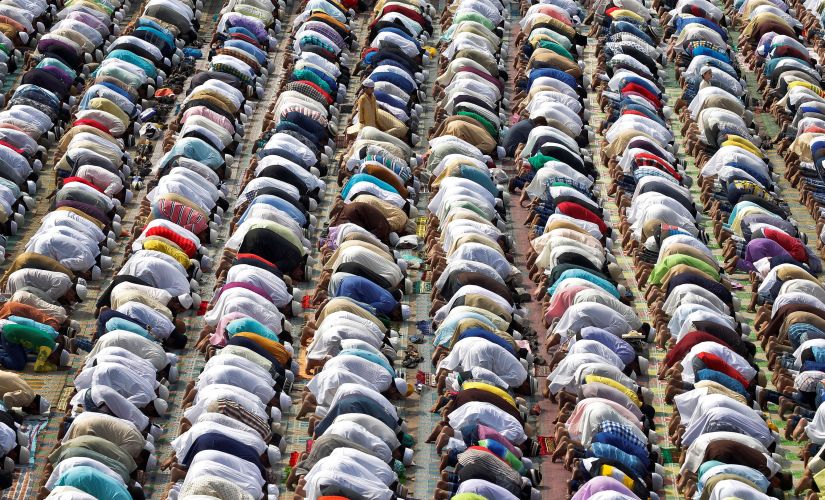 People offer their Eid prayers at the Feroz Shah Kotla dargah in Delhi. Reuters
