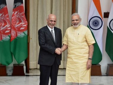Prime Minister Narendra Modi greets Afghan President Ashraf Ghani in New Delhi on Monday. PTI