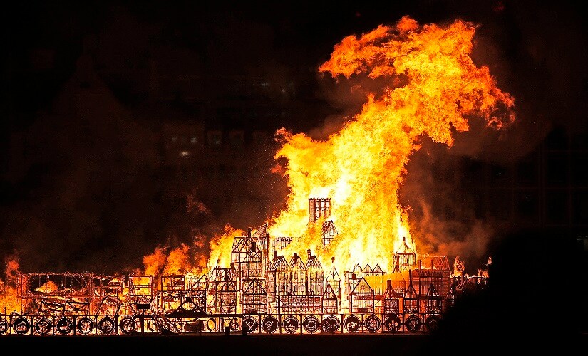 A 120-metre long sculpture of the 17th Century London skyline is set alight in a retelling of the story of the Great Fire of London in 1666. AP