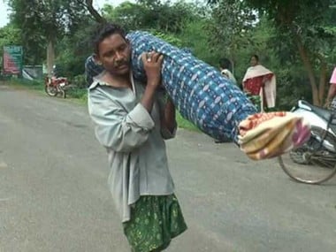 A file image of Odisha man Dana Majhi who had to carry the body of his wife as the hospital staff denied him a vehicle. PTI