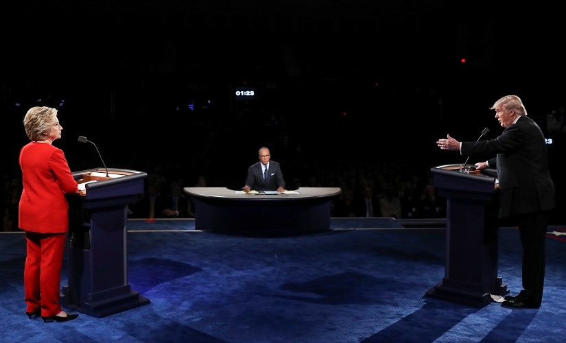 Republican presidential nominee Donald Trump points toward Democratic presidential nominee Hillary Clinton during the presidential debate at Hofstra University. AP