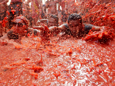 Here's the sauce on Spain's La Tomatina festival, where people paint the town red with tomatoes Here's the sauce on Spain's La Tomatina festival, where people paint the town red with tomatoes