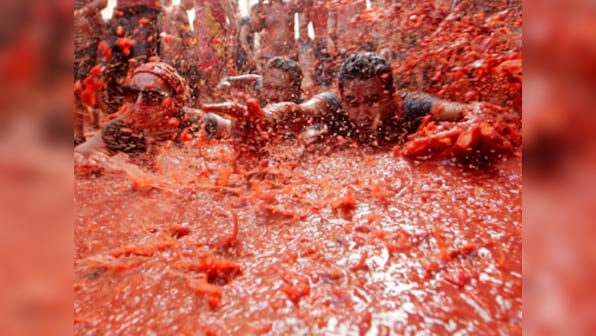 Here's the sauce on Spain's La Tomatina festival, where people paint the town red with tomatoes