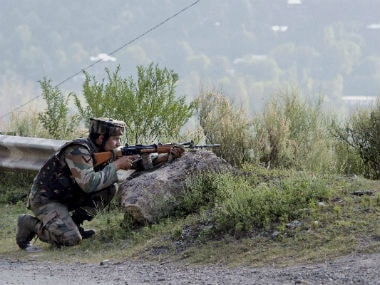 Soldiers outside the army camp which was attacked in Uri. PTI