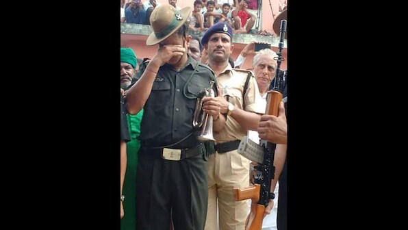 The Last Post: A soldier sheds a tear for an Uri martyr