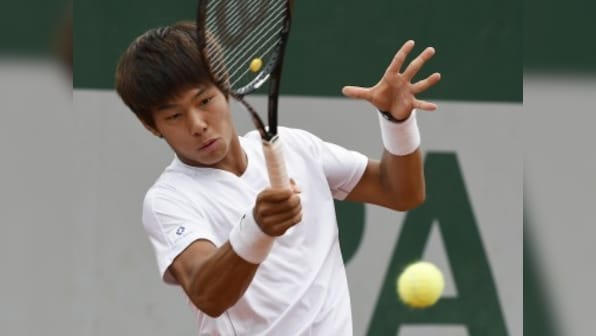 South Korea's hearing-impaired player Duckhee Lee hits right note on tennis court