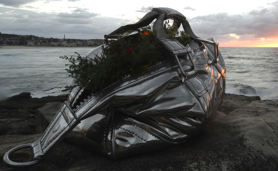 The event received close to 500 submissions this year from sculptors in 27 countries around the world. A giant bag sculpture made from stainless steel is seen in the picture. Photo: AFP The event received close to 500 submissions this year from sculptors in 27 countries around the world. A giant bag sculpture made from stainless steel is seen in the picture. Photo: AFP